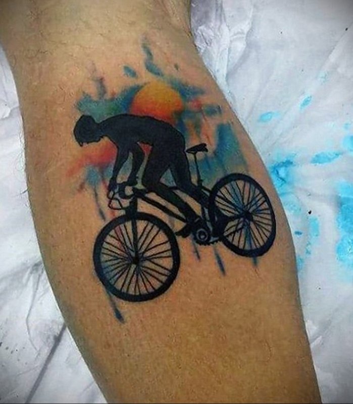 Colorful bicycle tattoo on leg for men