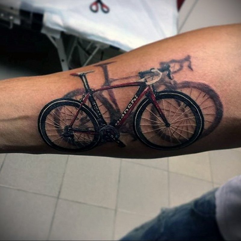 Bicycle tattoo on arm for men