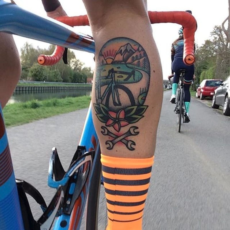 Bicycle tattoo on calf for men