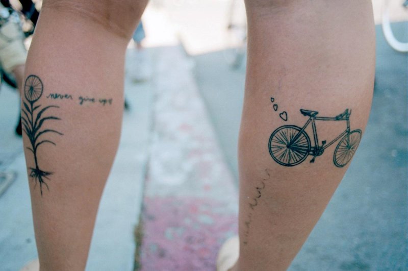 Bicycle tattoo on calf for men