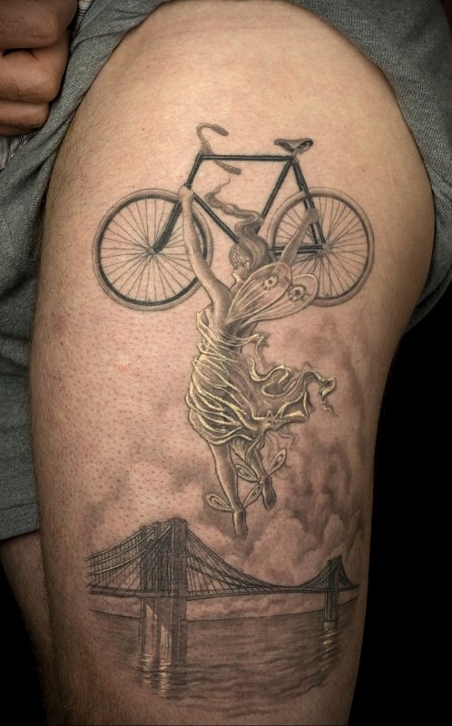 Bicycle tattoo on thigh for men