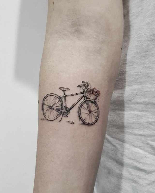 Bicycle tattoo on forearm for men