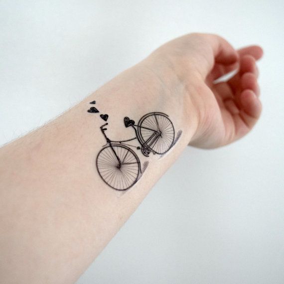 Bicycle tattoo on forearm for men