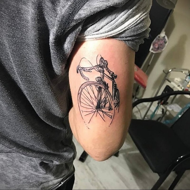 Bicycle tattoo on shoulder for men