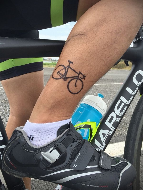 Bicycle tattoo on leg for men