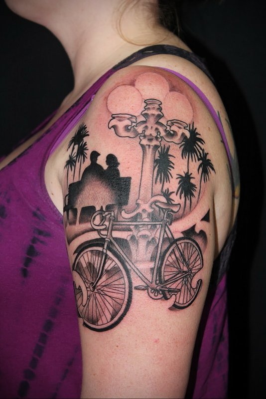 Bicycle tattoo on shoulder for women