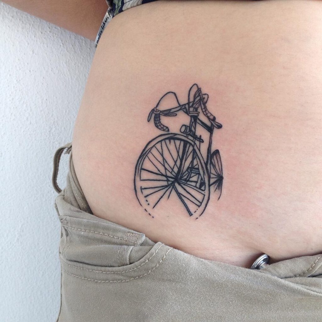 Bicycle tattoo on stomach for women