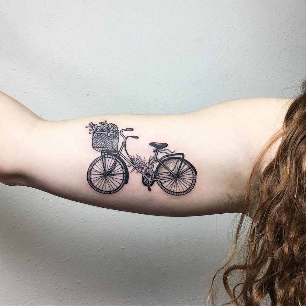 Bicycle tattoo on shoulder for women