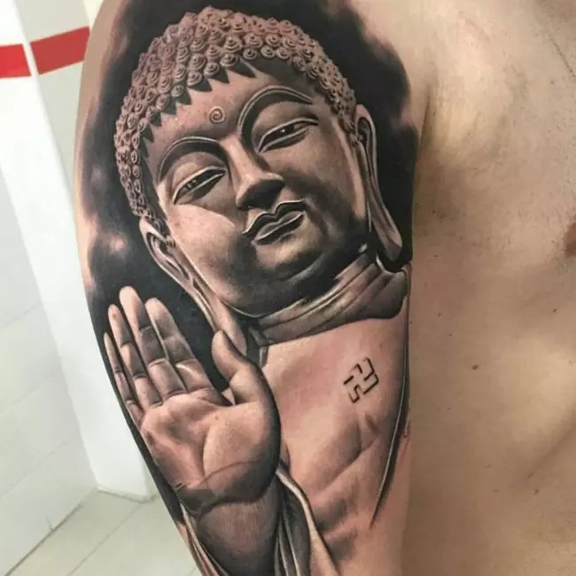 Large Buddha tattoo on the shoulder for men