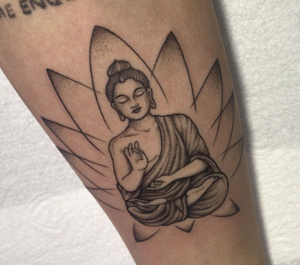 Buddha tattoo on forearm for men