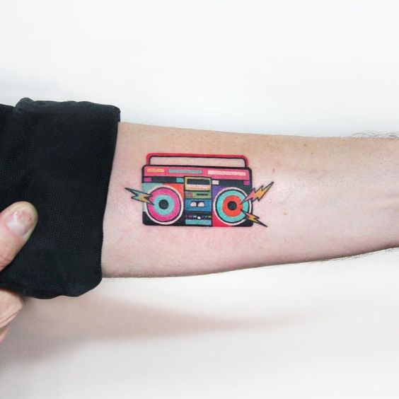 Tattoo a cassette tape on the forearm for men