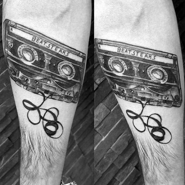 Cassette tape tattoo on the arm for men