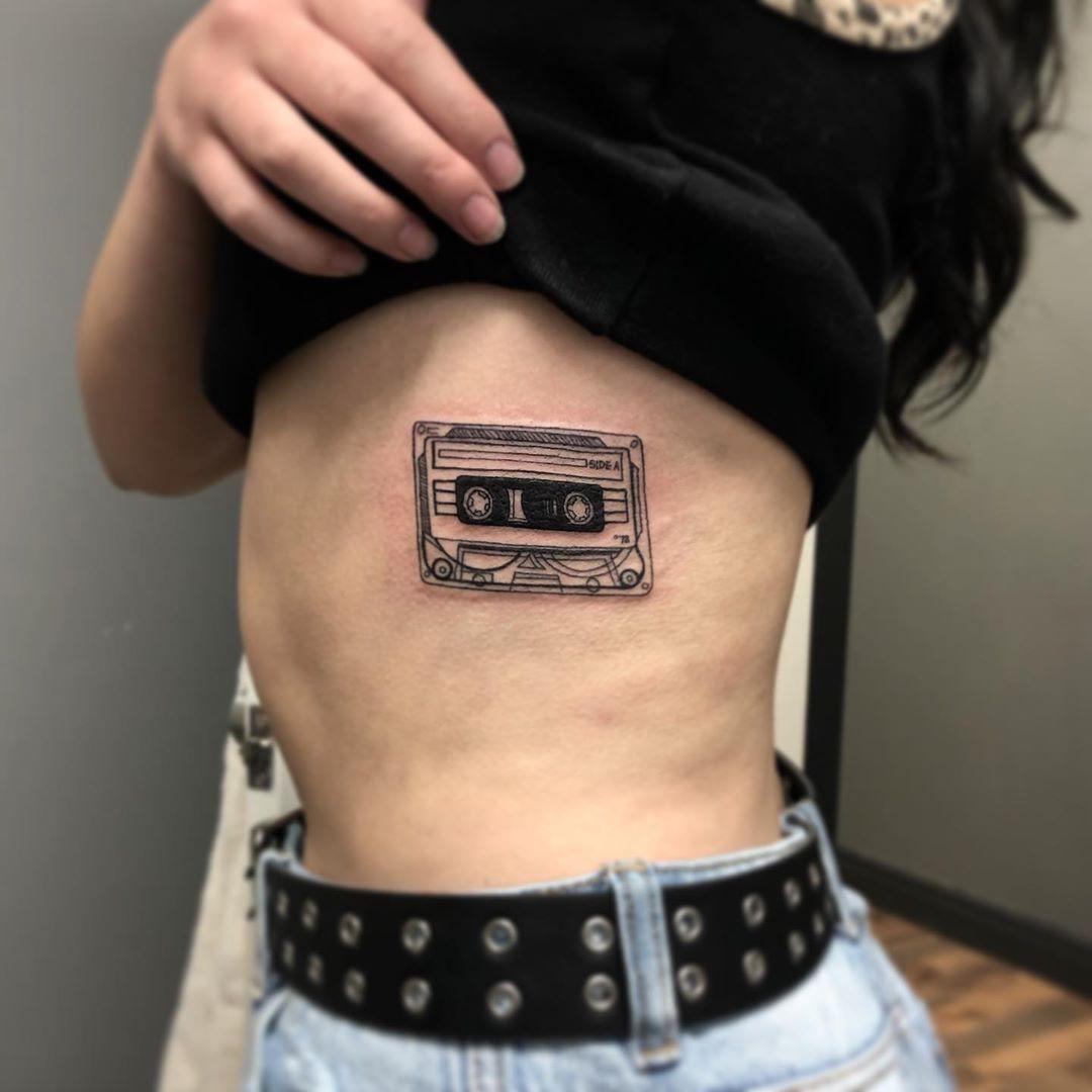 Cassette tape tattoo on the side for women