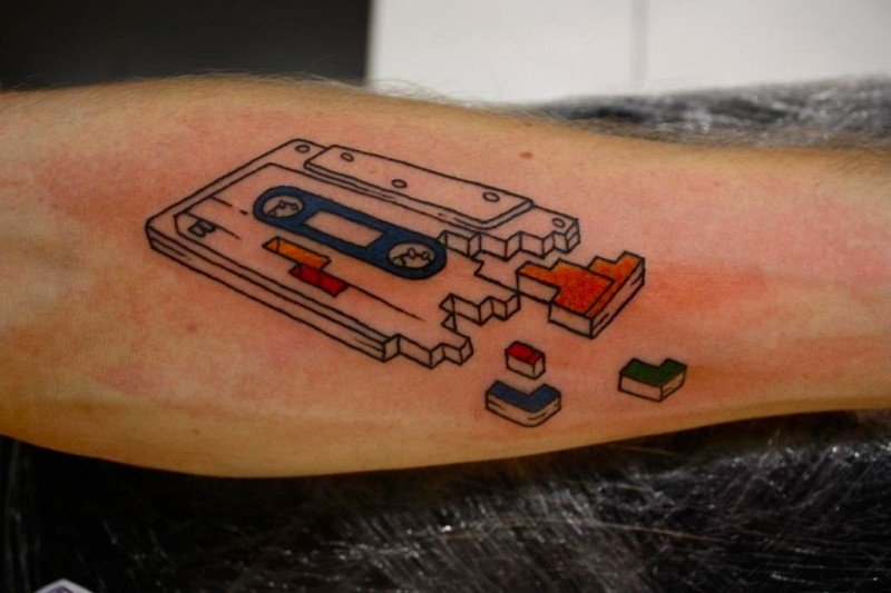 Tattoo a cassette tape on the forearm for men