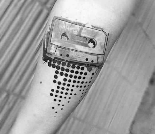 Cassette tape tattoo on the arm for men