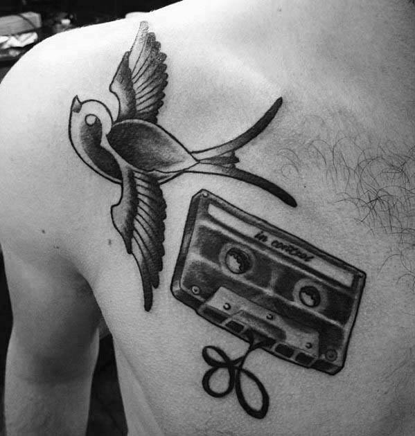 Tattoo a cassette tape and a bird on the chest for men