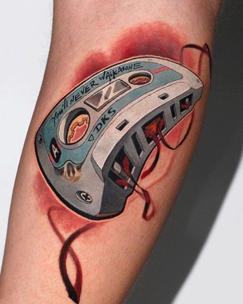 Colored cassette tape tattoo on forearm for men