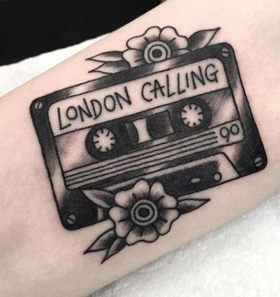 Cassette tape tattoo on the arm for men