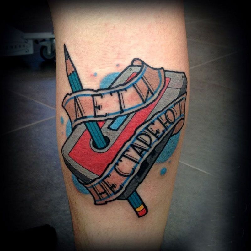 Tattoo a cassette tape on the leg for men