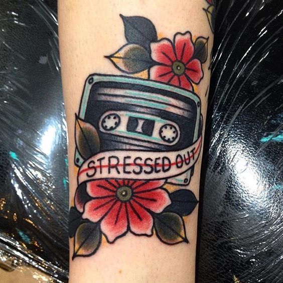 Cassette tape tattoo on the arm for men