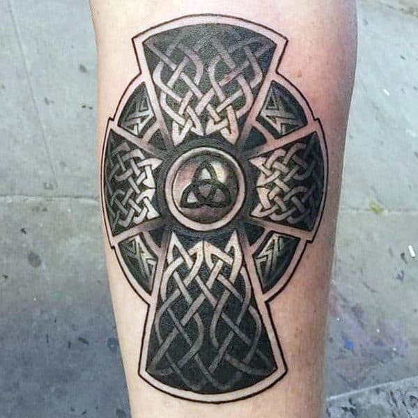 Celtic cross tattoo on arm for men