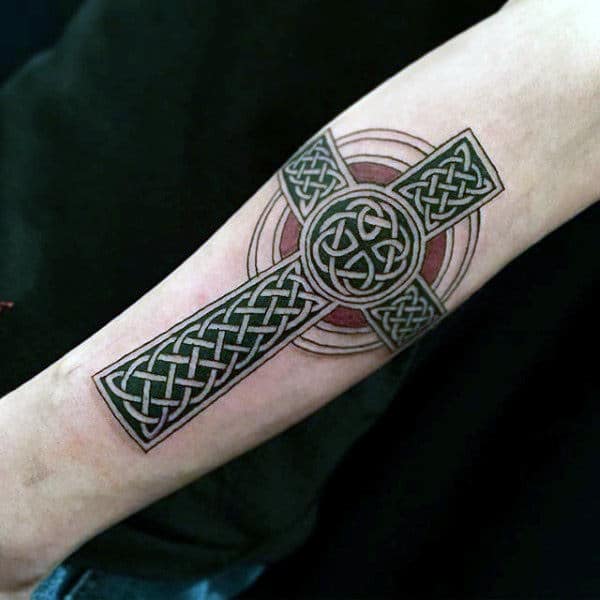 Celtic cross tattoo on forearm for men