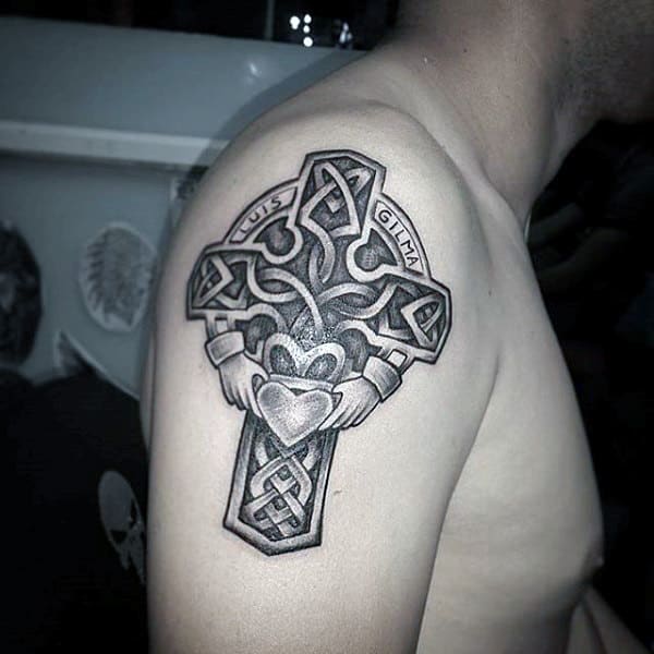 Celtic cross tattoo on shoulder for men