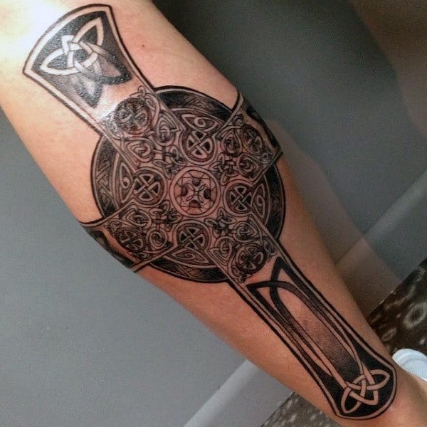 Celtic cross tattoo on leg for men