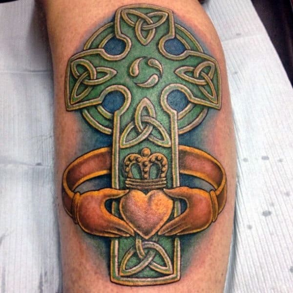 Color celtic cross tattoo on leg for men