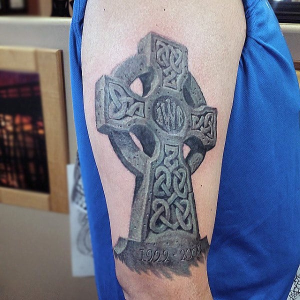 Celtic cross tattoo on shoulder for men