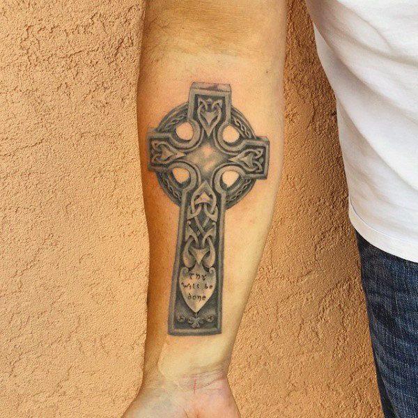 Celtic cross tattoo on forearm for men