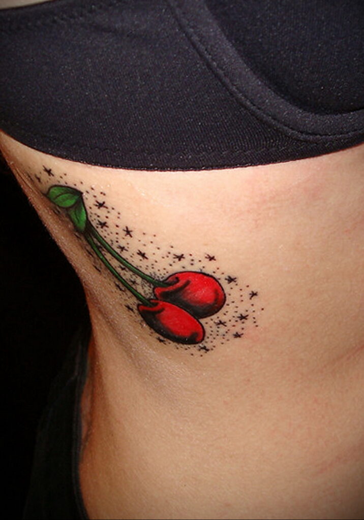 Cherry tattoo on the side for women