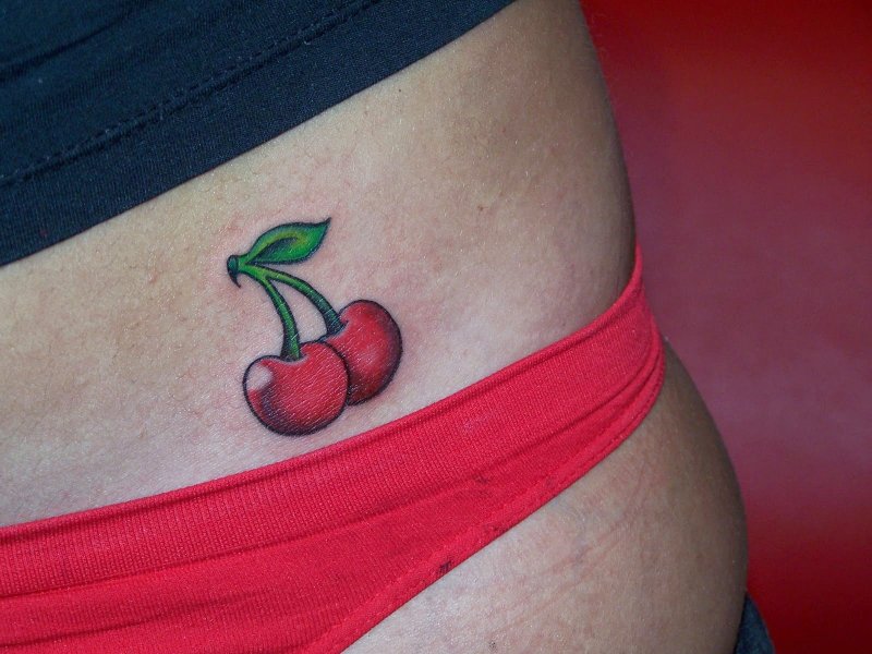 Cherry belly tattoo for women