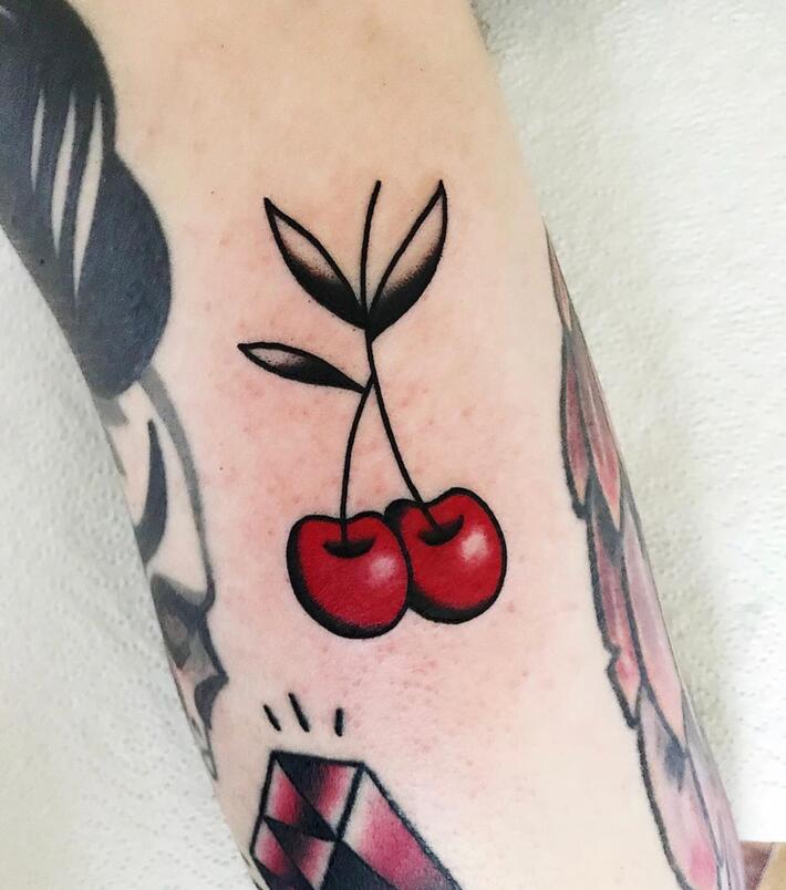 Cherry tattoo on leg for men