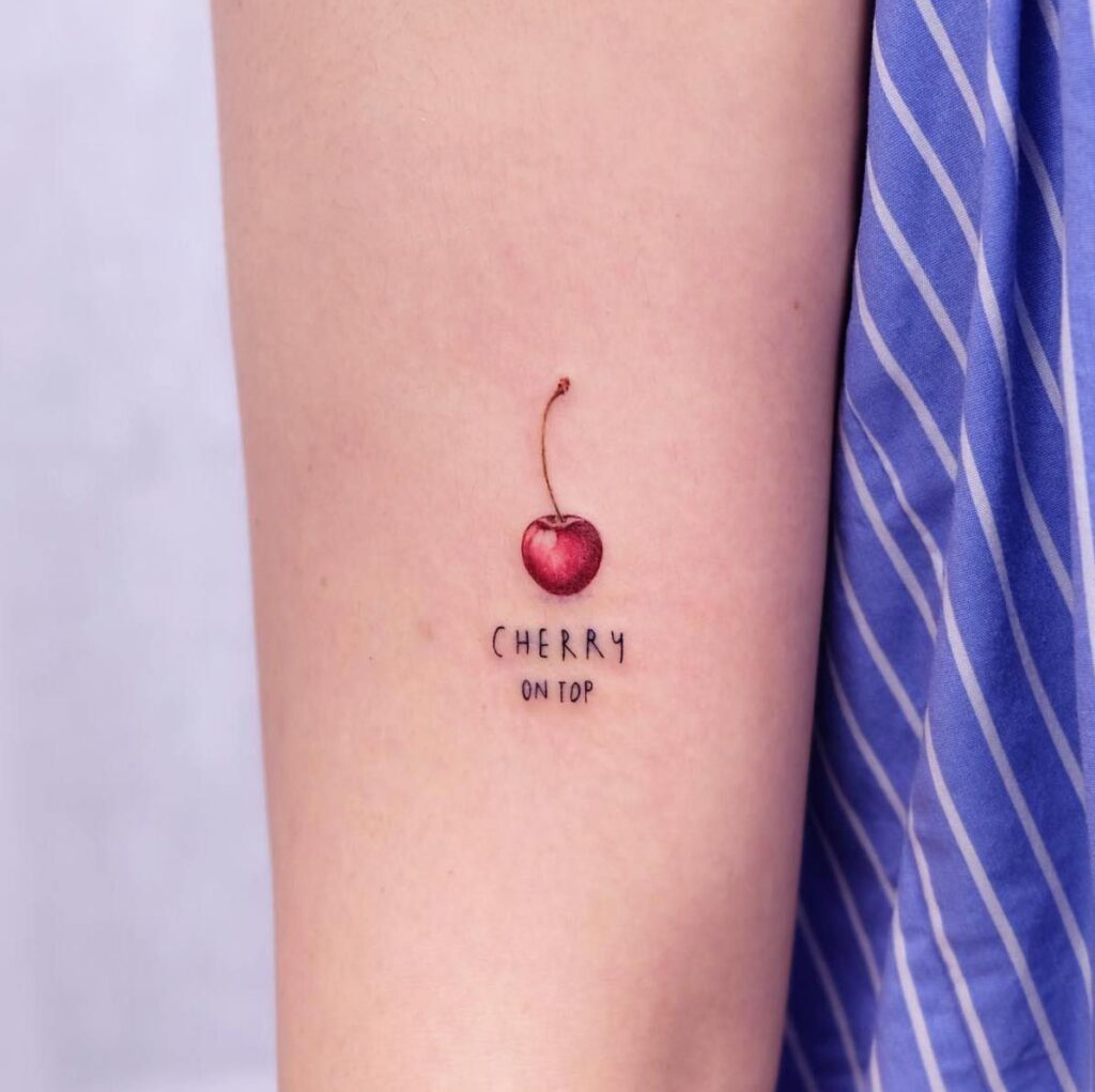 Cherry tattoo on shoulder for women