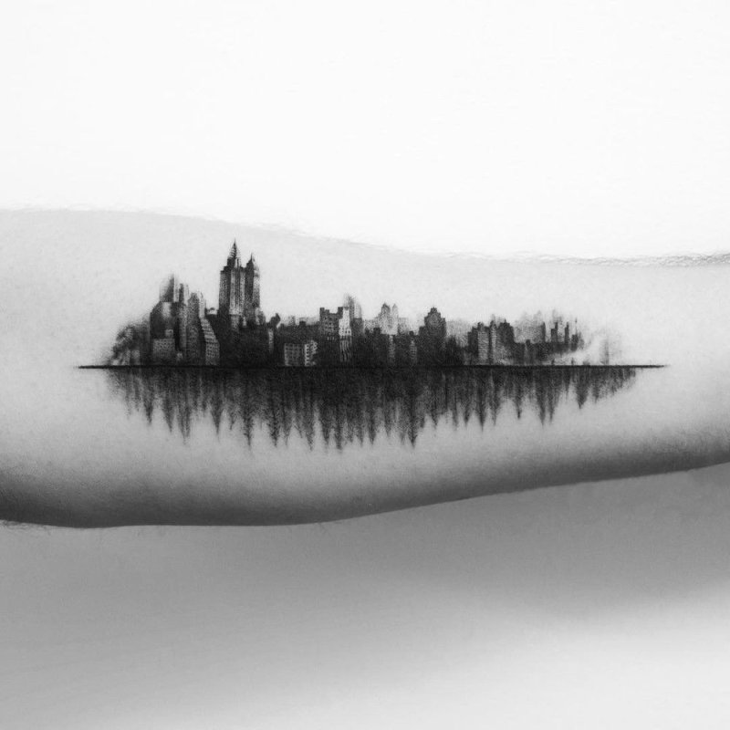 City tattoo on the arm for men