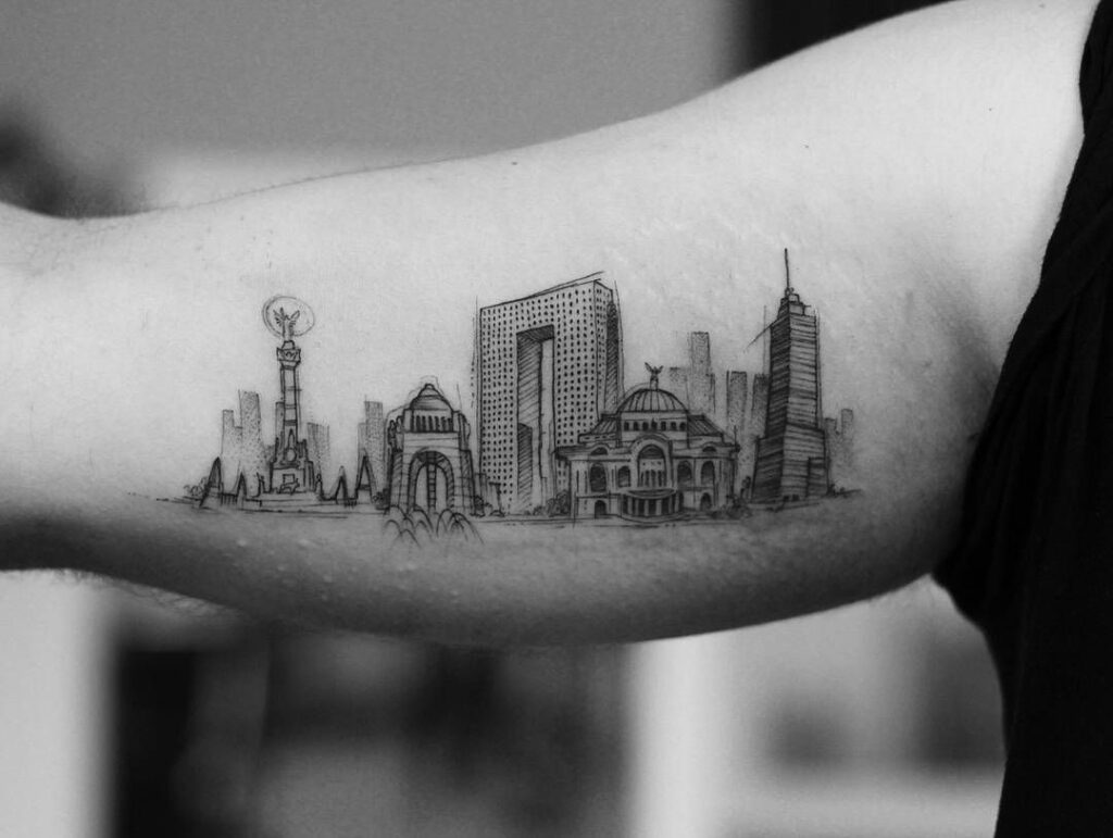 City tattoo on the bicep for men