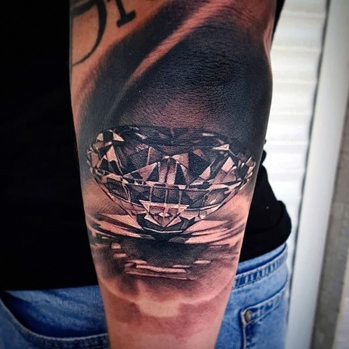 Diamond tattoo on arm for women