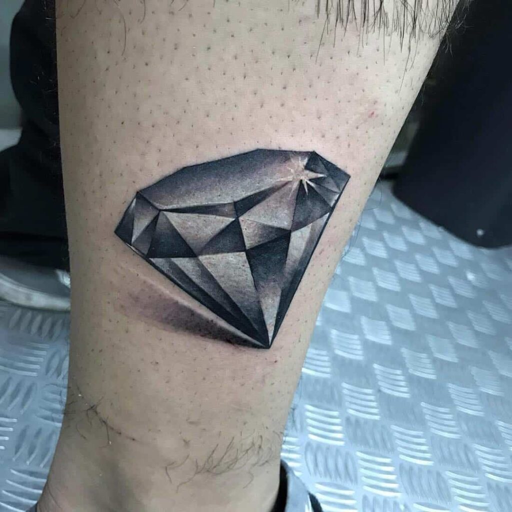 Diamond tattoo on lower leg for men