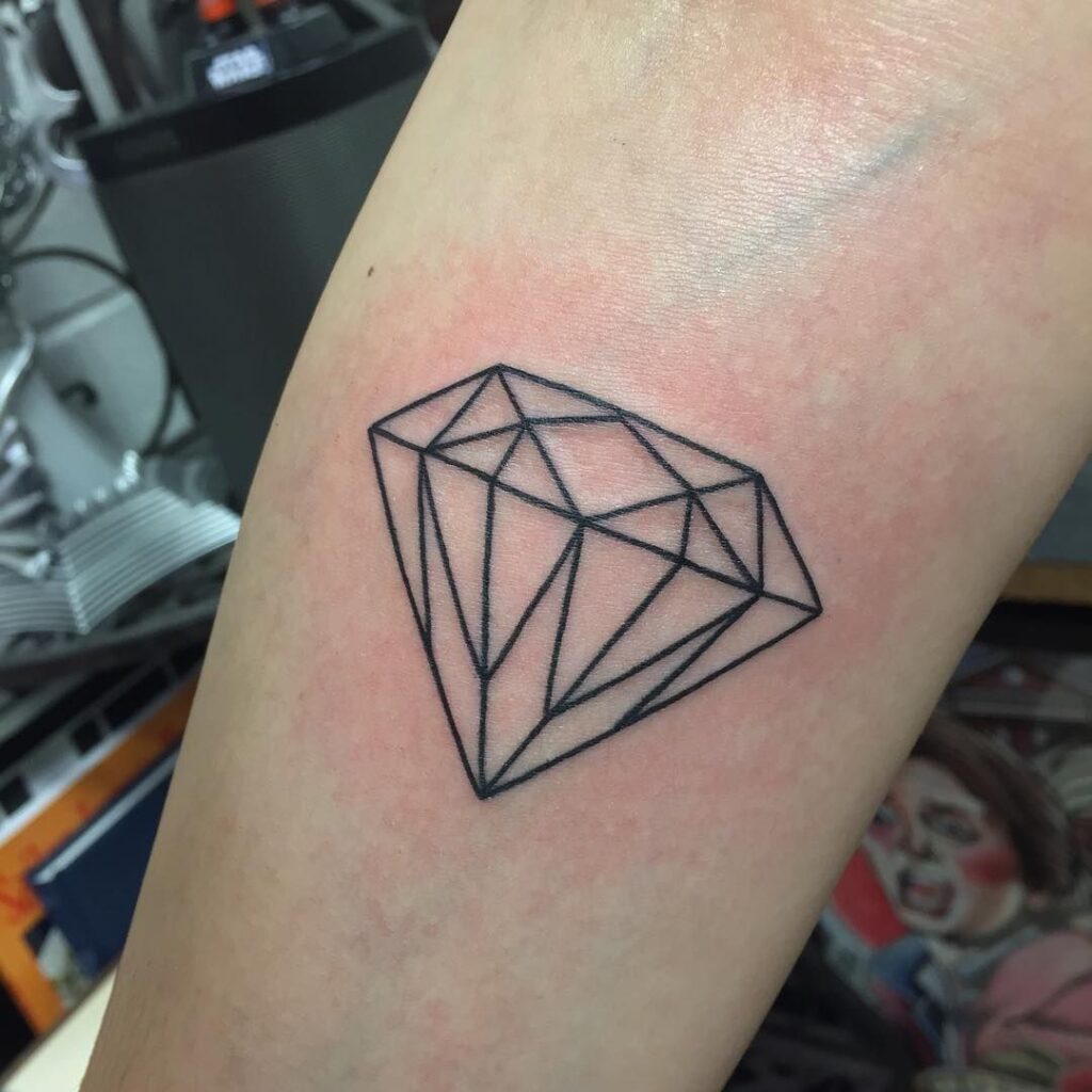 Diamond tattoo on forearm for women