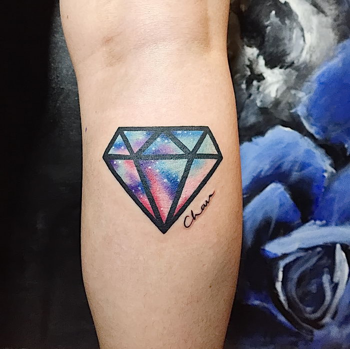 Diamond tattoo on calf for women