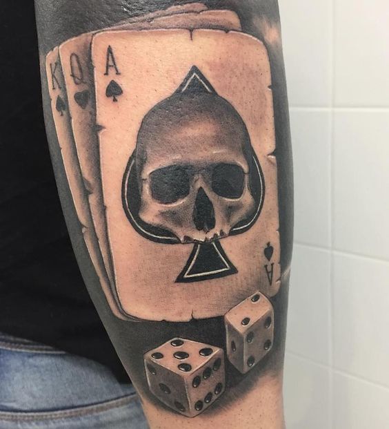 Dice tattoo on the arm for men