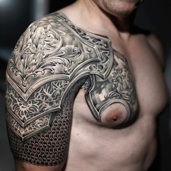 Large armor tattoo on the shoulder for men