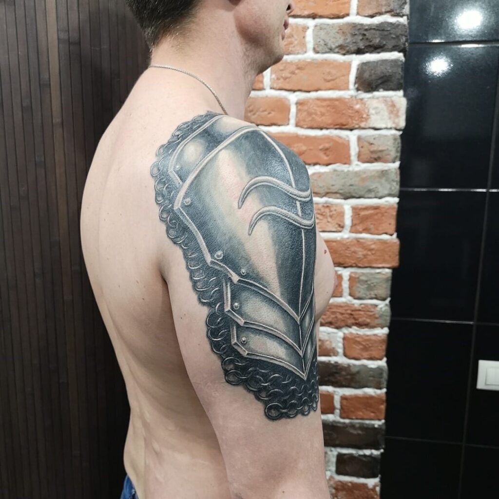 Armor tattoo on shoulder for men