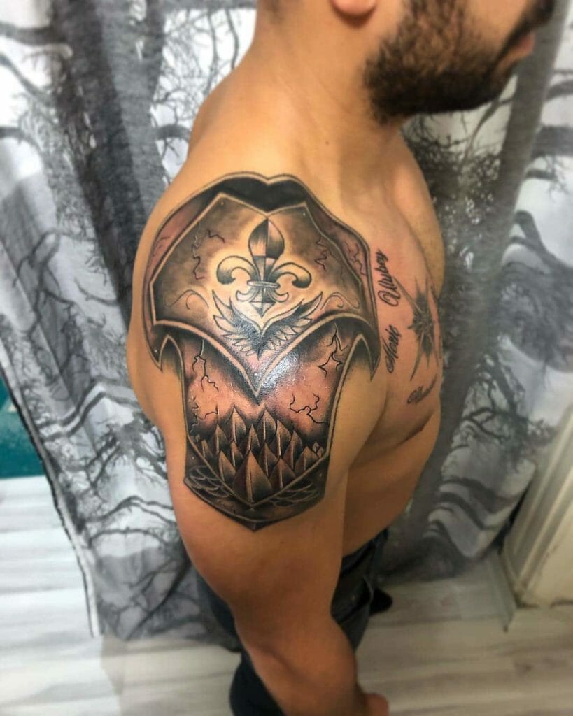 Armor tattoo on shoulder for men