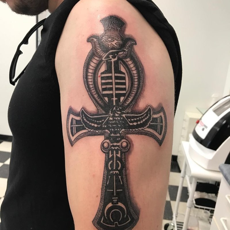 Ankh tattoo on the shoulder for men