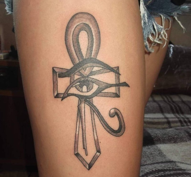 Ankh tattoo on the thigh for women