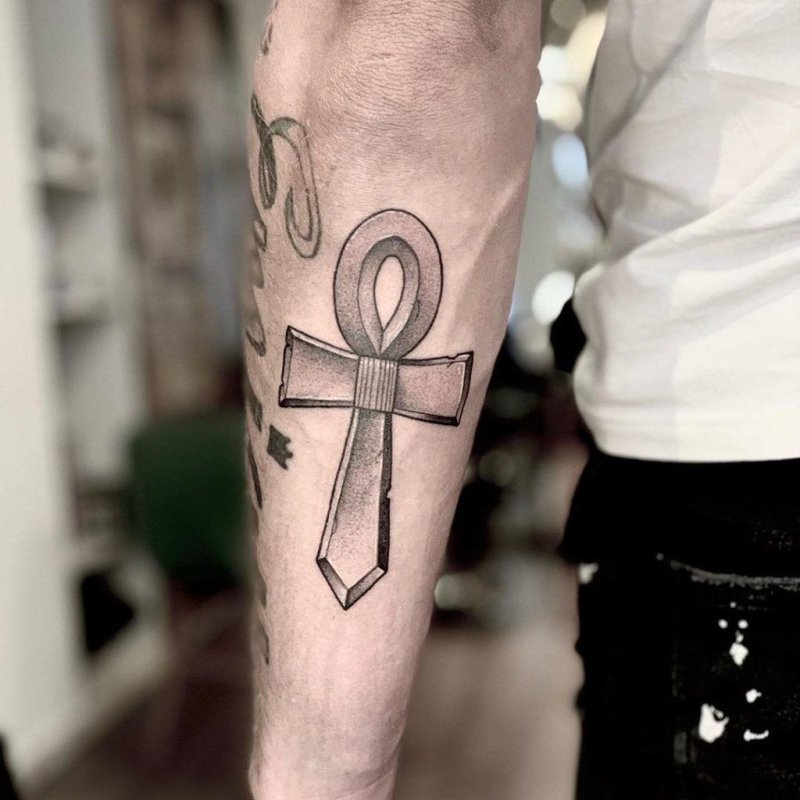 Ankh tattoo on forearm for men