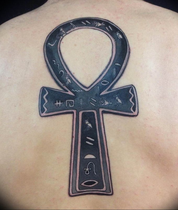 Large ankh tattoo on the back for men