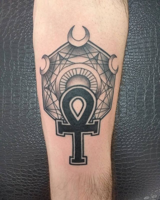 Ankh tattoo on forearm for men